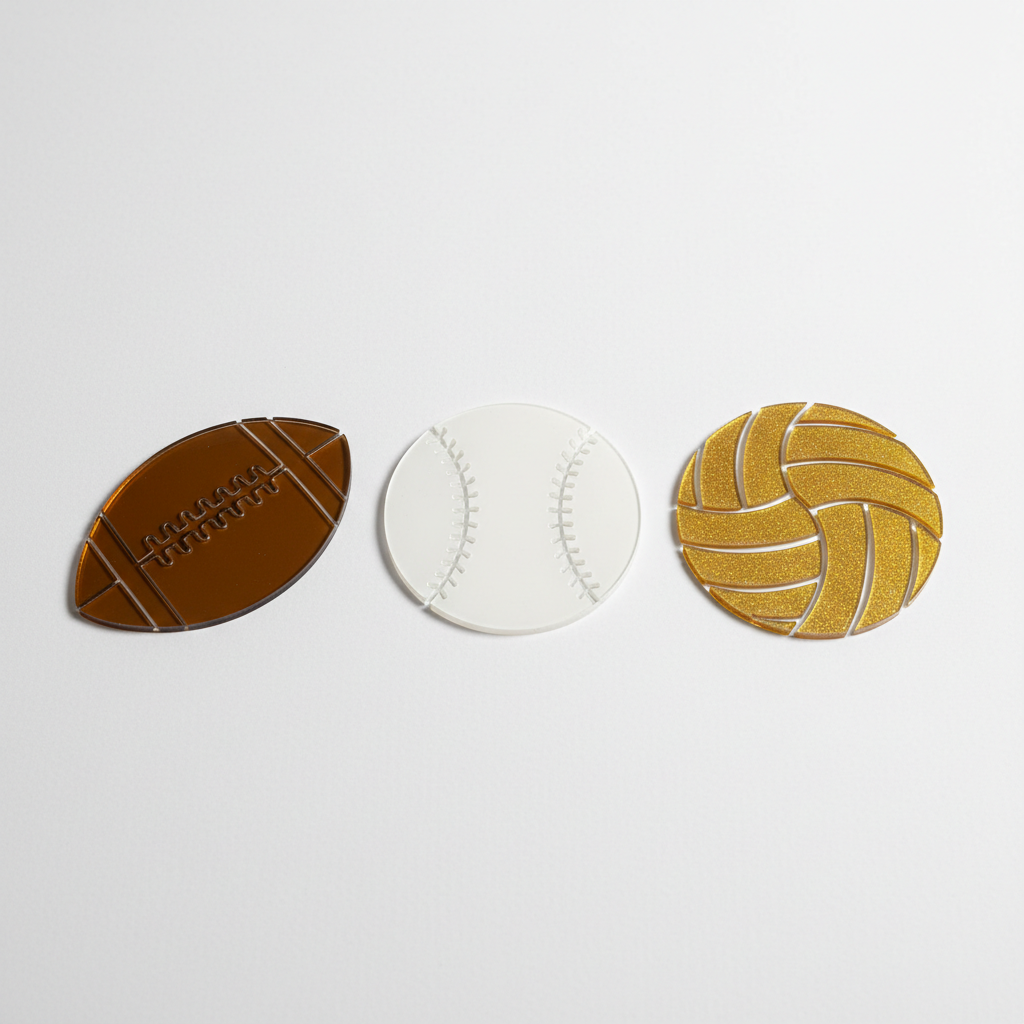 Laser-cut acrylic sports shape cutouts: softball, football, volleyball
